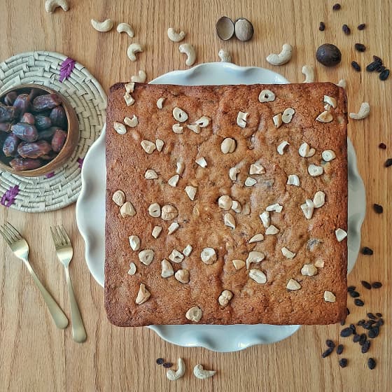 Dates cake on table with ingredients