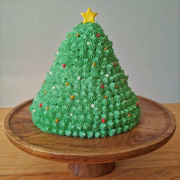 Christmas tree cake made with Vanilla cake and frosting.