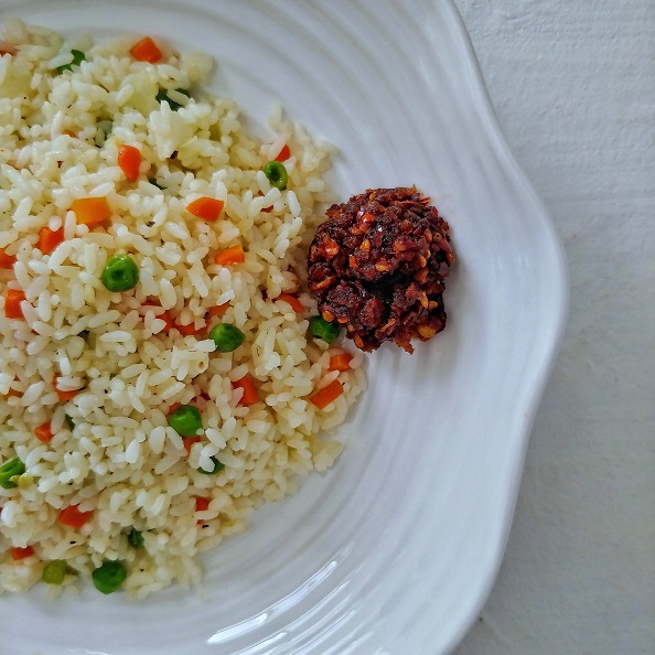 Fried rice with Chili paste on a plate.
