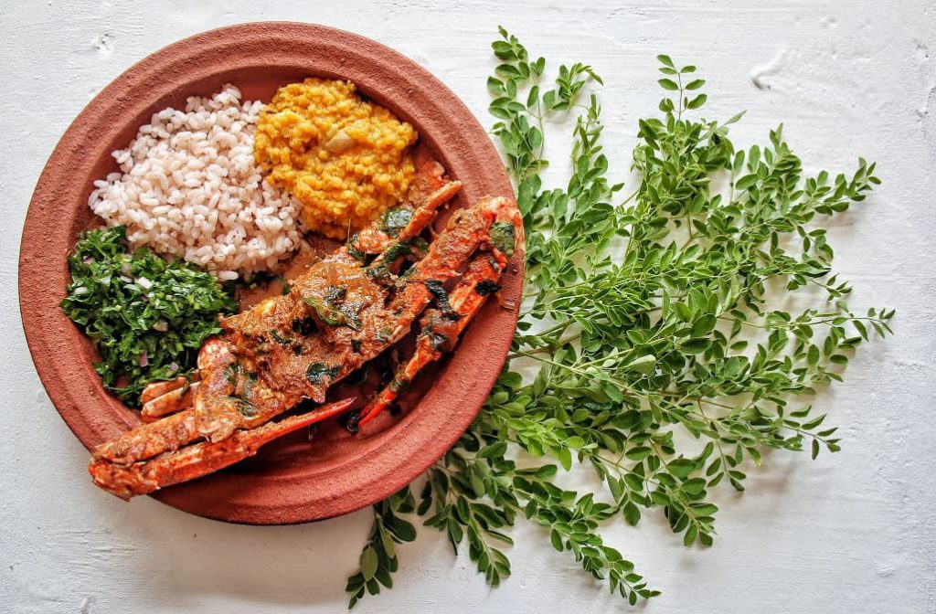 Jaffna crab curry served with side if rice, lentil curry and Gotu kola sambal. 