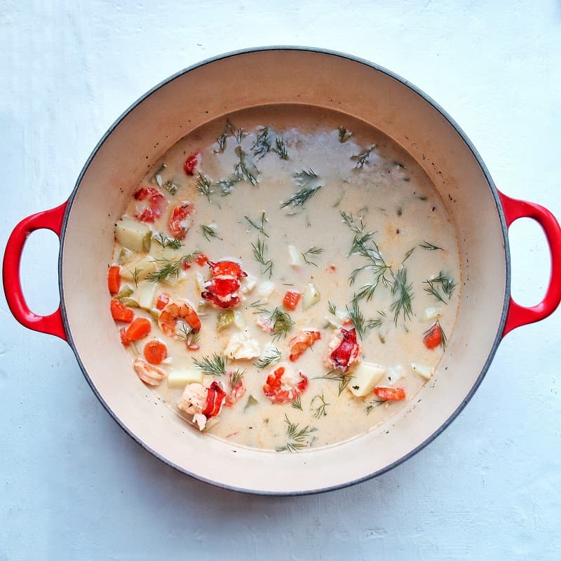 Dairy free seafood chowder in a Le creuset in Cherry Pot.