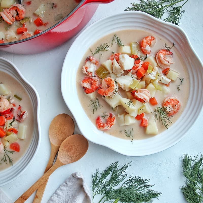 Dairy-Free Seafood Chowder with Shrimp, Lobster and Cod served in a bowl.