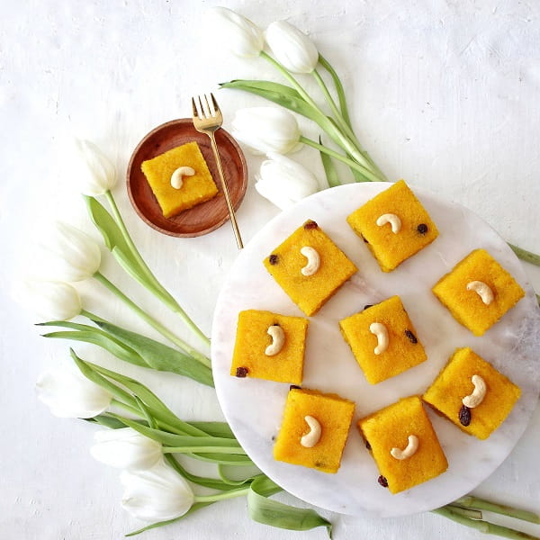 Dairy free rava Kesari / semolina sweet presented on a tray.